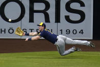 Milwaukee Brewers left fielder Billy McKinney makes a diving catch for the out on San Diego Padres' Wil Myers during the fourth inning of a baseball game Tuesday, April 20, 2021, in San Diego. (AP Photo/Gregory Bull)