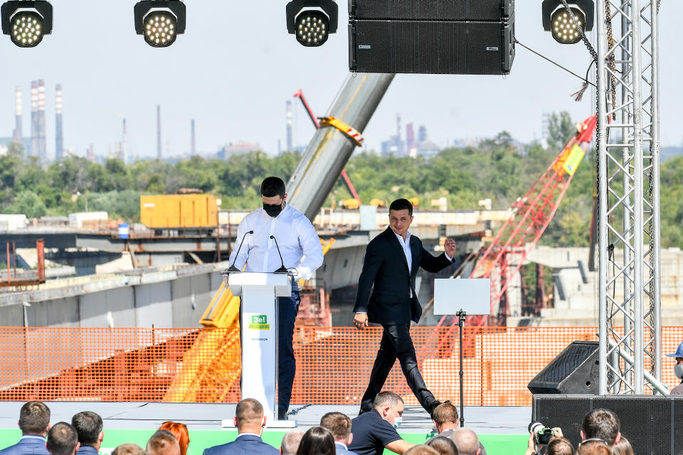 President of Ukraine Volodymyr Zelenskyy (R) and Deputy Prime Minister, Minister of Digital Transformation of Ukraine Mykhailo Fedorov are seen on stage during the presentation of the action plan to implement the Zaporizhzhia Regional Development Strategy on August 19th 2020.<span class="copyright">Dmytro Smolyenko—Ukrinform/Getty Images</span>