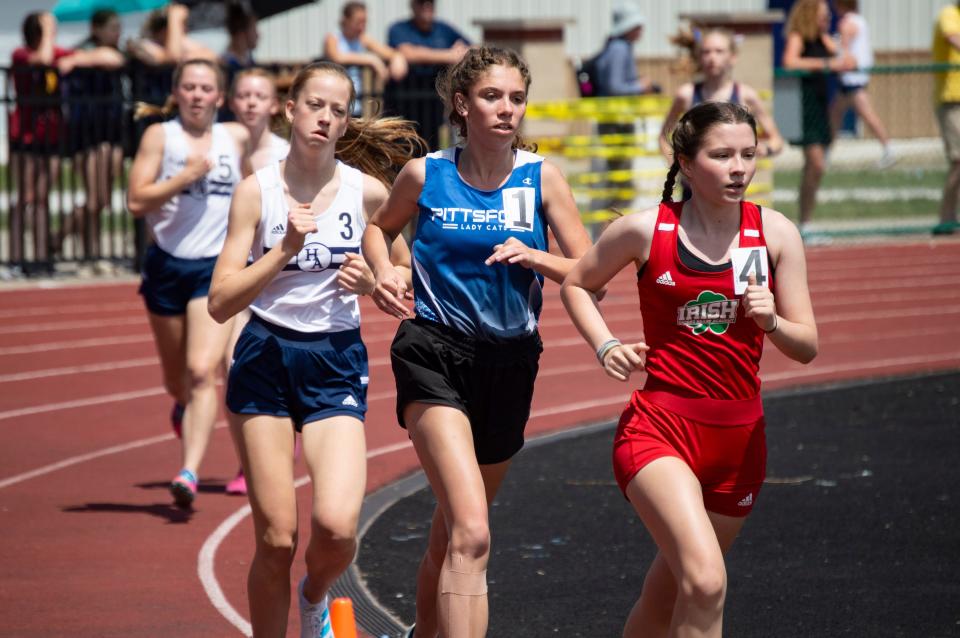 Pittsford junior Brooke Smith (center) won her second athlete of the week honor of the spring sports season after winning the 1600 and 3200-meter runs at MITCA's state finals.