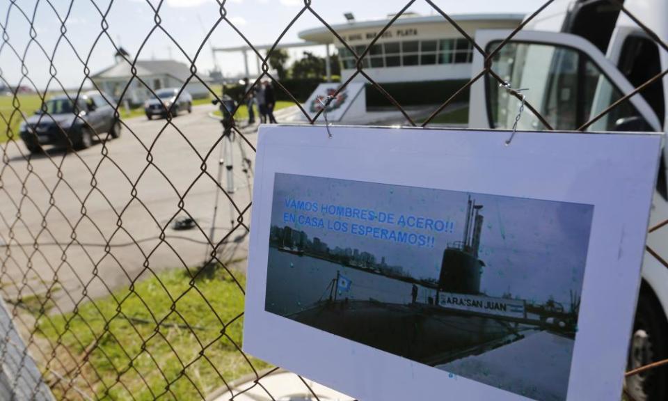A picture of the Argentine submarine ARA San Juan hangs on the fence of the Mar del Plata naval base