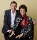 In this Wednesday, Nov. 13, 2013 photo, Philomena Lee, right, poses for a portrait with Steve Coogan, a cast member in the film "Philomena," at the Four Seasons Hotel in Beverly Hills, Calif. Lee was an unwed, pregnant teenager in 1952 when her Irish Catholic family sent her to a convent in shame. After three years, the boy was sold for adoption to the United States, and Lee spent the next five decades looking for him. Coogan optioned Sixsmith’s 2009 book, “The Lost Child of Philomena Lee,” without even reading it, determined to bring the story to the screen. (Photo by Chris Pizzello/Invision/AP)