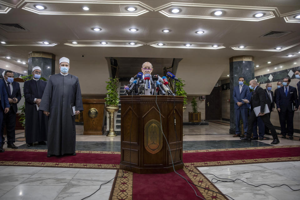 French Foreign Minister Jean-Yves Le Drian speaks during a press conference after a meeting with Muslim Grand Imam, Sheikh Ahmed el-Tayeb, at the headquarters of Al Azhar, in Cairo, Egypt, Sunday, Nov. 8, 2020. Le Drian visited Cairo on Sunday to meet with political and religious leaders in an effort to calm tensions and misunderstandings with the Arab and Muslim world following anti-French protests and three Islamic extremist attacks on France. (AP Photo/Nariman El-Mofty)
