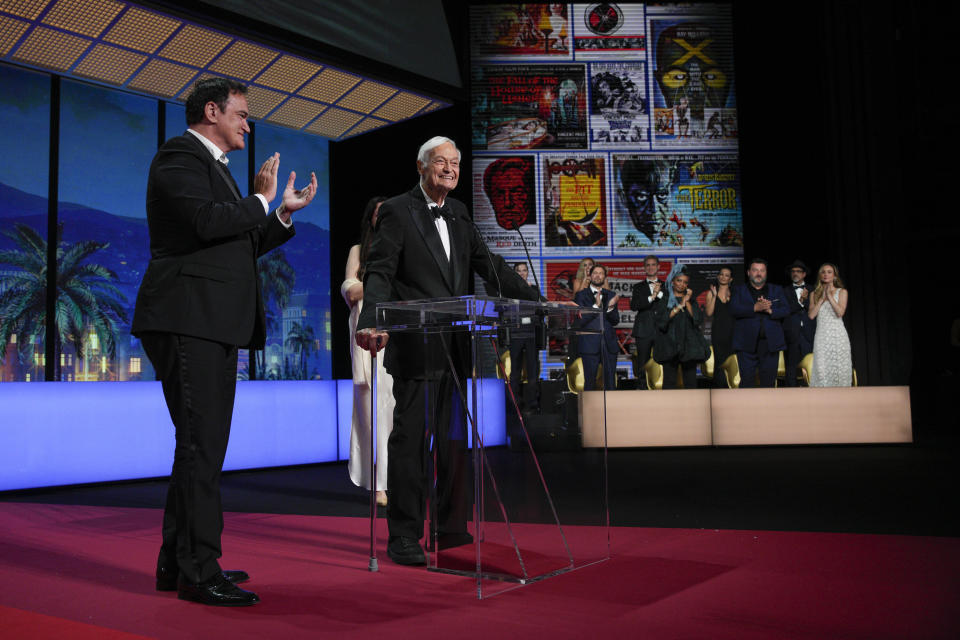 Quentin Tarantino, left, and Roger Corman appear during the awards ceremony of the 76th international film festival, Cannes, southern France, Saturday, May 27, 2023 (AP Photo/Daniel Cole)