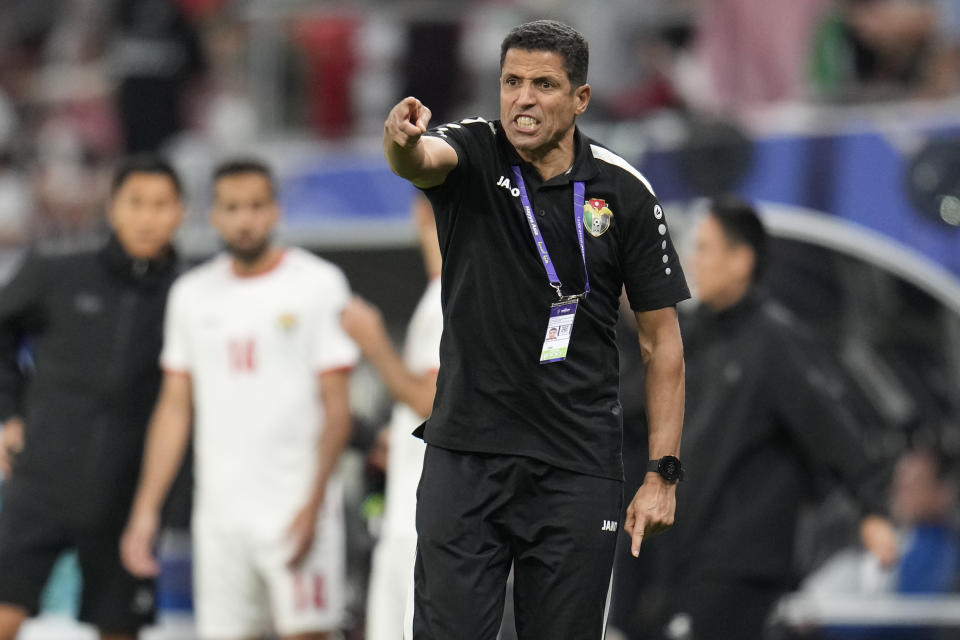 Jordan's head coach Lhoussanine Ammouta reacts during the Asian Cup semifinal soccer match between South Korea and Jordan at Ahmad Bin Ali Stadium in Al Rayyan, Qatar, Tuesday, Feb. 6, 2024. (AP Photo/Aijaz Rahi)