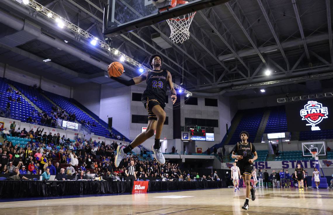 Cameron Scott (23) of Lexington goes up for a dunk during the second half of Lexington’s game against James F. Byrnes in the SCHSL 5A Boys Basketball State Final at the Florence Center on Friday, March 1, 2024.