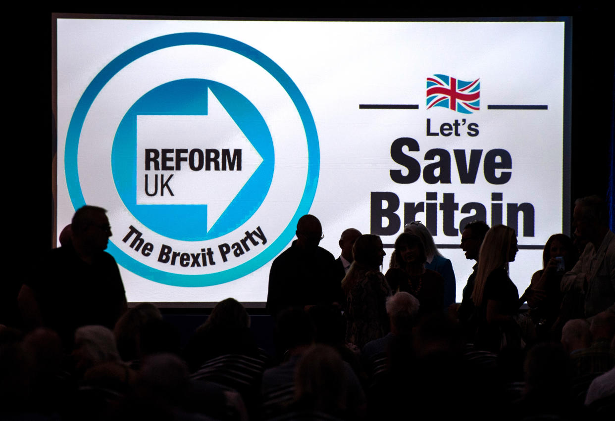 LONDON, ENGLAND - OCTOBER 7: A screen displays the Reform Party logo at the Reform Party annual conference on October 7, 2023 in London, England. The Reform Party was founded by members including Nigel Farage and its current leader is Richard Tice. (Photo by Chris J Ratcliffe/Getty Images)