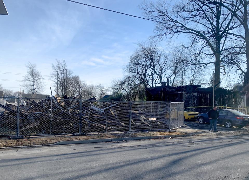 The charred remnants of 1322 and 1320 Tatum Street are left after a Jan. 13 explosion destroyaed both homes. A 54-year-old woman died; a 57-year-old man was hospitalized and several others were injured.