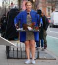 <p>Amy Schumer carries chickens in a cage when filming a scene for <em>Life and Beth </em>on March 24 in New York City.</p>