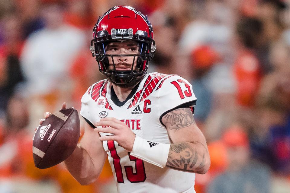 FILE - North Carolina State quarterback Devin Leary (13) plays against Clemson during an NCAA college football game Saturday, Oct. 1, 2022, in Clemson, S.C. North Carolina State quarterback Devin Leary plans to enter his name into the transfer portal for his final season of eligibility.
Leary tweeted a statement announcing his decision on Monday, Dec. 5, 2022. (AP Photo/Jacob Kupferman, File)