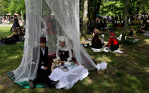 <p>Revellers attend the Victorian picnic during the Wave and Goth festival in Leipzig, Germany, June 2, 2017. (David W Cerny/Reuters) </p>