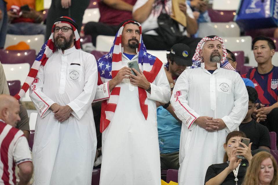 Fans wait for the World Cup round of 16 soccer match between the Netherlands and the United States, at the Khalifa International Stadium in Doha, Qatar, Saturday, Dec. 3, 2022. (AP Photo/Ashley Landis)