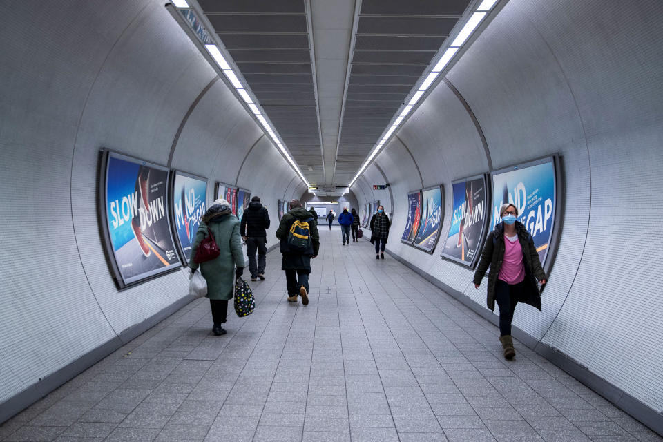  People wearing face masks seen inside a tube station in London.
Prime Minister Boris Johnson unveils plan to end England restrictions. A new four-step plan to ease England's lockdown could see all legal limits on social contact lifted by 21 June, if strict conditions are met. (Photo by May James / SOPA Images/Sipa USA) 