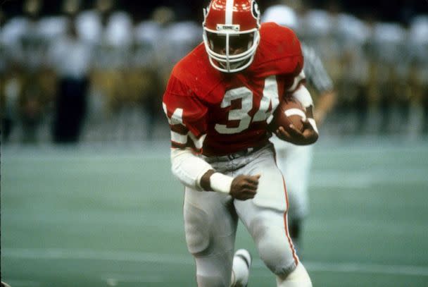 PHOTO: Running back Herschel Walker #34 of the University of Georgia Bull Dogs carries the ball against the Notre Dame Fighting Irish during the Sugar Bowl game January 1, 1981 at the Louisiana Superbowl in New Orleans. (Focus On Sport/Getty Images, FILE)