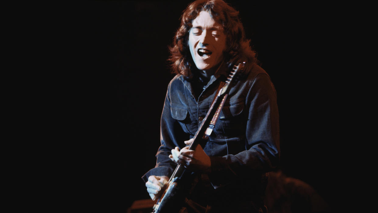  Rory Gallagher performs on stage at Reading Festival, United Kingdom, 16th March 1975. 