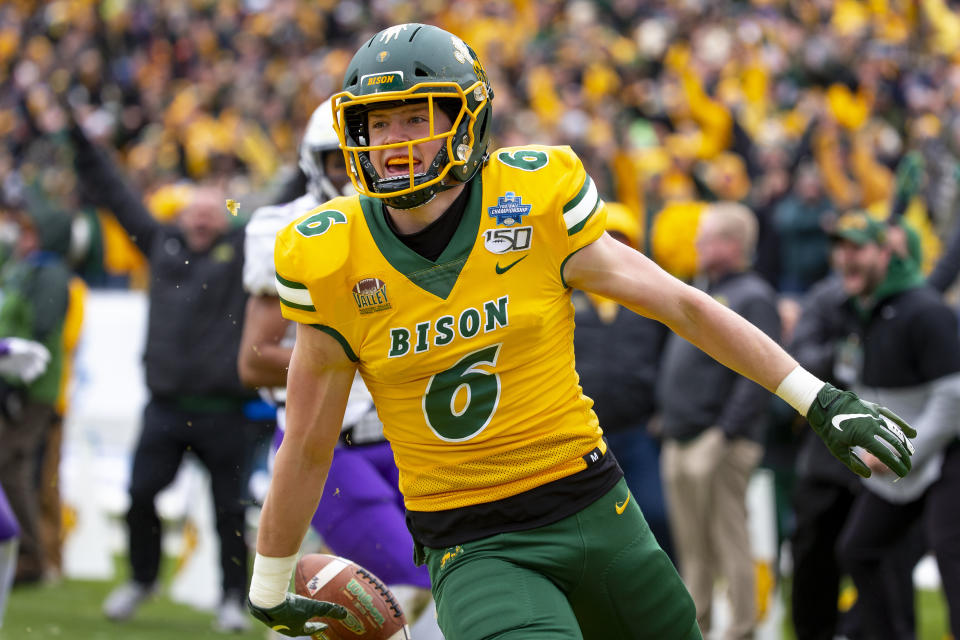 North Dakota State safety James Hendricks (6) smiles after scoring on a fake field goal attempt during the first half of the FCS championship NCAA college football game against James Madison, Saturday, Jan. 11, 2020, in Frisco, Texas. (AP Photo/Sam Hodde)