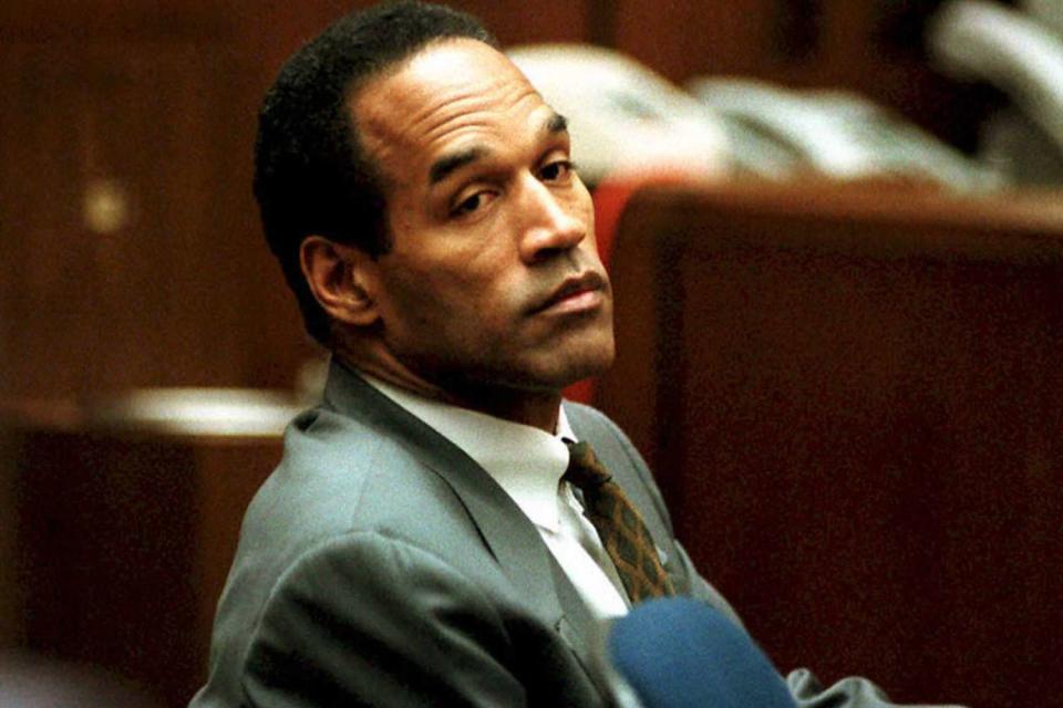 <p>POOL/AFP via Getty</p> O. J. Simpson sits in Superior Court in Los Angeles 08 December 1994 during an open court session where Judge Lance Ito denied a media attorney