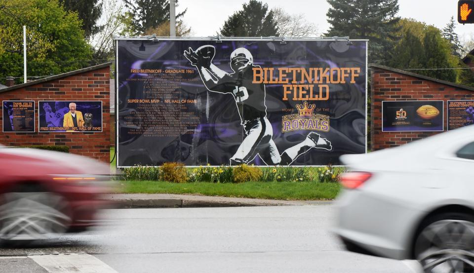 Peach Street traffic passes by Biletnikoff Field at Erie High School in Erie on May 2.