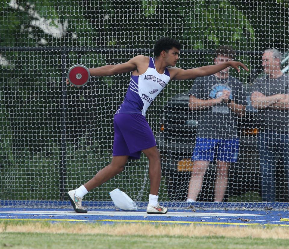 Monroe-Woodbury's Rohan Sonakya competes in the discus throw during the Section 9 track and field state qualifier on June 2, 2023.