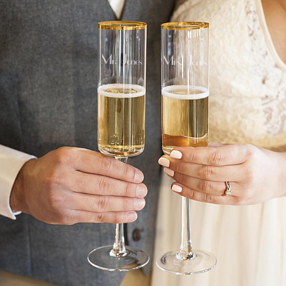 Cathy’s Concepts Personalized 8 oz. Gold Rim Contemporary Champagne Flutes (set of two). (Photo: Walmart)