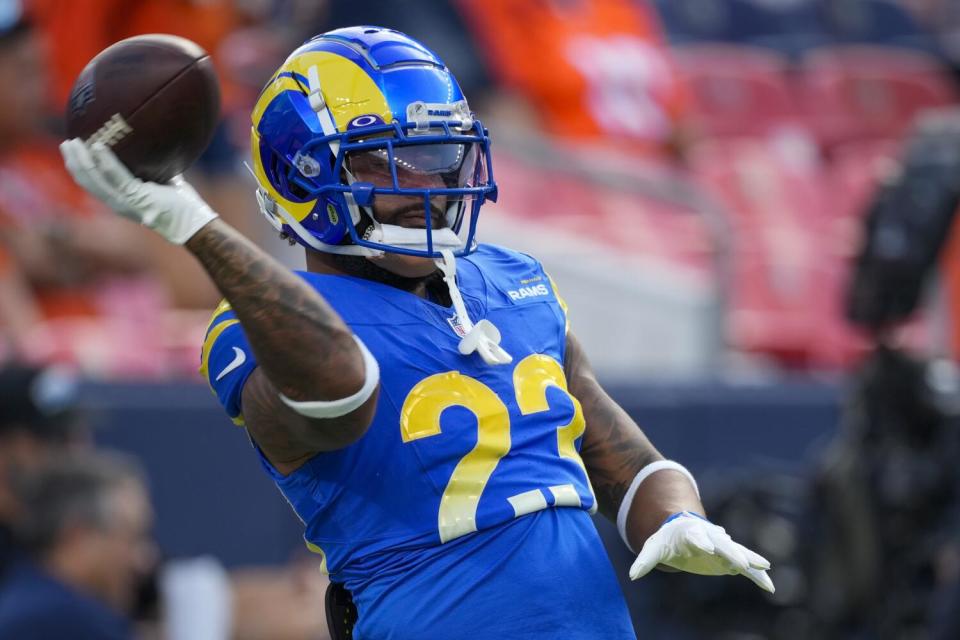 Rams running back Kyren Williams warms up before Saturday's game against the Denver Broncos.