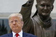 President Donald Trump visits Saint John Paul II National Shrine with first lady Melania Trump, Tuesday, June 2, 2020, in Washington. (AP Photo/Patrick Semansky)