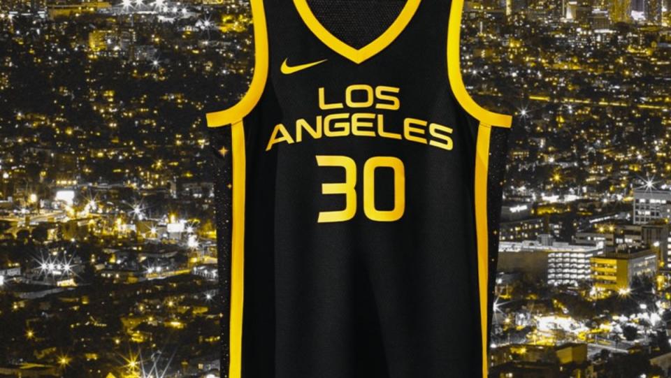 Los Angeles Sparks black and white Rebel jersey over a backdrop of Los Angeles