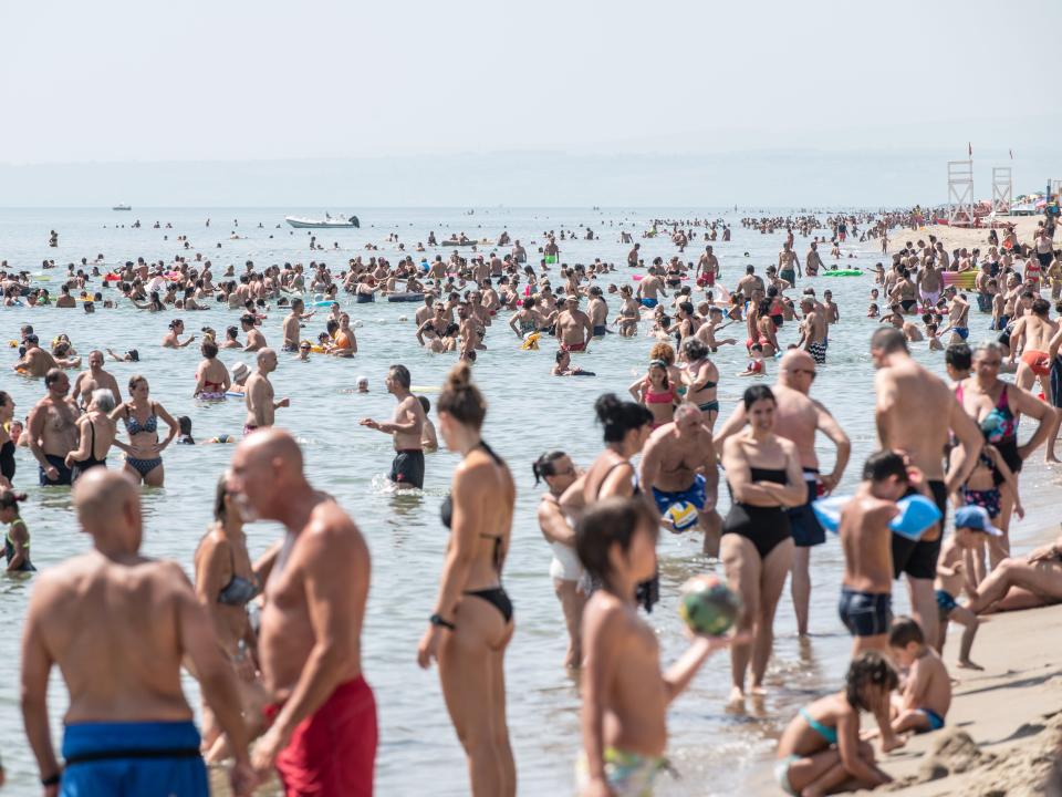 Beachgoers flocked to the sea in Catania, Italy, to find refreshment amid a high-temperature alert on July 16, 2023.