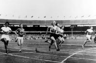 <p>Australian Betty Cuthbert won three gold medals in the 200-meter , 4x100-meter and 100-meter events.</p><p><a rel="nofollow noopener" href="http://www.goodhousekeeping.com/life/inspirational-stories/a39313/kate-grosmaire-conor-mcbride-forgive-daughters-killer/" target="_blank" data-ylk="slk:Read more inspiring stories on Good Housekeeping.;elm:context_link;itc:0;sec:content-canvas" class="link "><em>Read more inspiring stories on Good Housekeeping.</em></a></p>