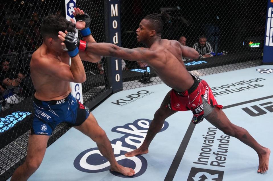 LAS VEGAS, NEVADA – AUGUST 12: (R-L) Terrance McKinney punches Mike Breeden in a lightweight fight during the UFC Fight Night event at UFC APEX on August 12, 2023 in Las Vegas, Nevada. (Photo by Al Powers/Zuffa LLC via Getty Images)