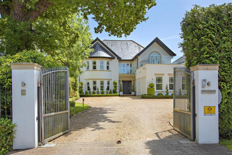 <p>On the market for £4.6 million is this beautiful double-fronted home in the heart of Hertfordshire. We love the large swimming pool, white-gloss flooring, games room, gym, private cinema space, large bedrooms and stylish kitchen. </p><p><a href="https://www.zoopla.co.uk/for-sale/details/51944225" rel="nofollow noopener" target="_blank" data-ylk="slk:This property is for sale via Lumleys Estate Agent for £4,600,000.;elm:context_link;itc:0;sec:content-canvas" class="link ">This property is for sale via Lumleys Estate Agent for £4,600,000.</a> </p>