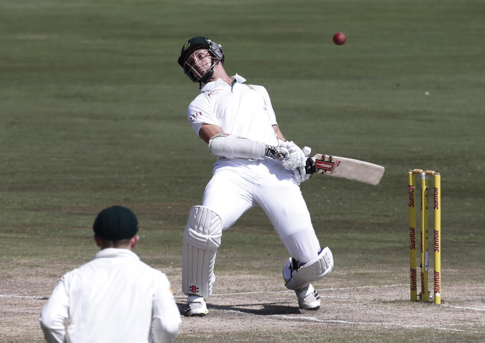 South Africa's Ryan McLaren ducks a bouncer during the fourth day of their first cricket test match against Australia in Pretoria, February 15, 2014. REUTERS/Mike Hutchings (SOUTH AFRICA - Tags: SPORT CRICKET)