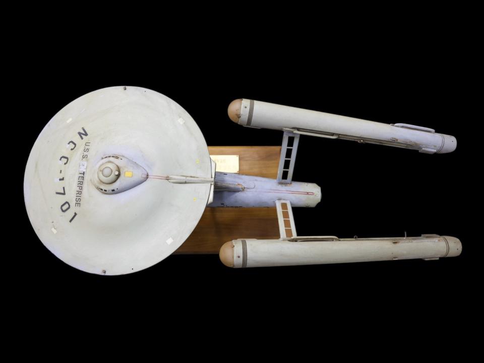 The first model of the USS Enterprise is displayed at Heritage Auctions in Los Angeles, April 13, 2024. The model — used in the original “Star Trek” television series — has been returned to Eugene “Rod” Roddenberry, the son of “Star Trek” creator Gene Roddenberry, decades after it went missing in the 1970s. (Josh David Jordan/Heritage Auctions via AP)