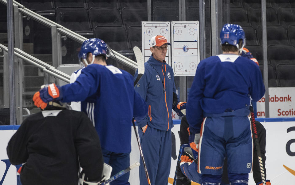 Edmonton Oilers head coach Kris Knoblauch talks to the team during NHL hockey practice, Wednesday June 12, 2024, in Edmonton, Alberta. The Oilers host the Florida Panthers in Game 3 of the Stanley Cup Finals on Thursday. (Jason Franson/The Canadian Press via AP)