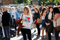 <p>A woman waits to take part in a vigil for the victims of an attack on concert goers at Manchester Arena, in central Manchester, Britain on May 23, 2017. (Darren Staples/Reuters) </p>