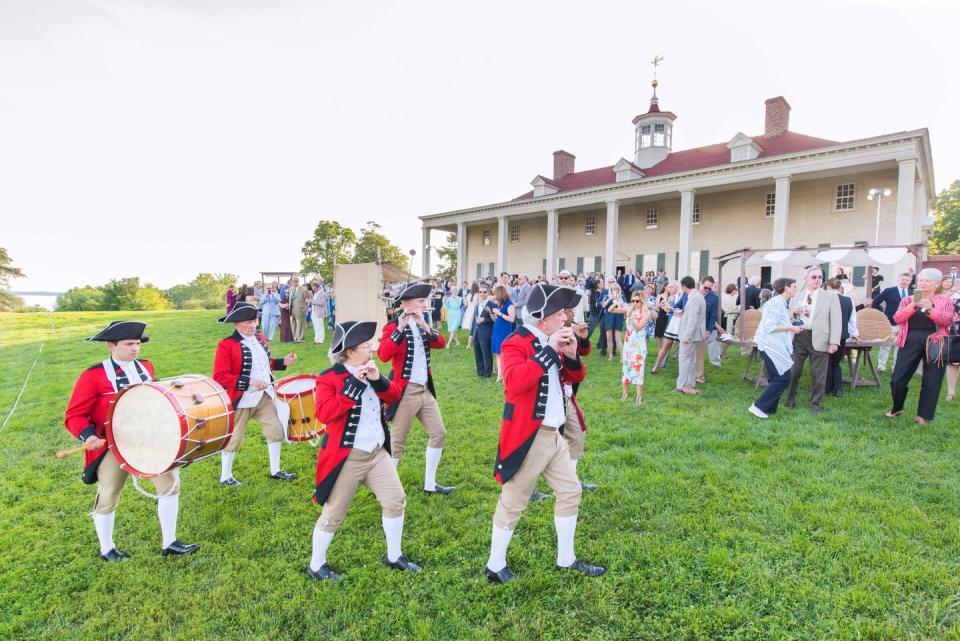 A Fife and Drum Corps performs.