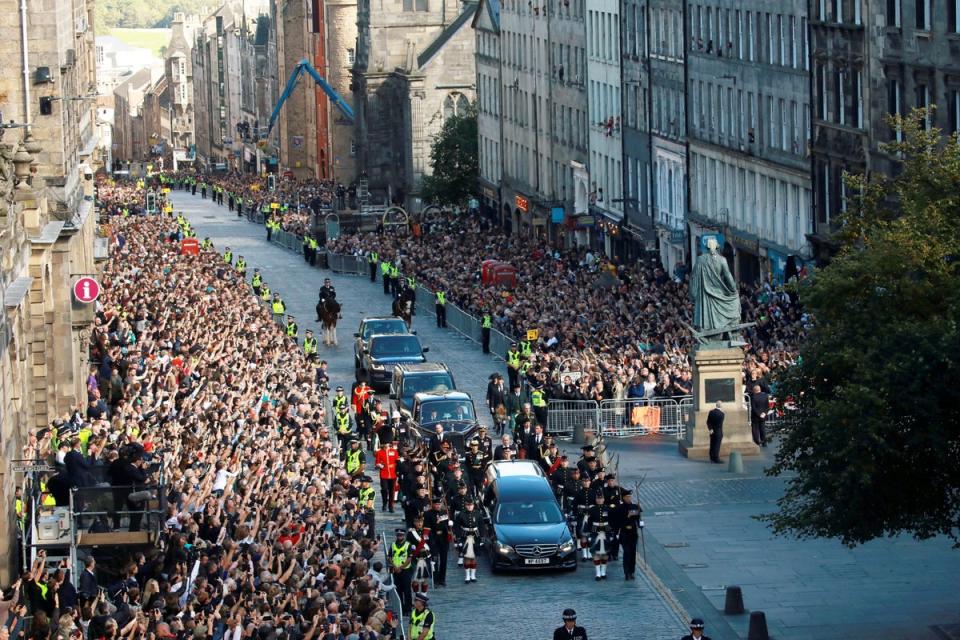 12 September 2022: Crowds line the Royal Mile, Edinburgh, as King Charles III joins a procession from the Palace of Holyroodhouse to St Giles’ Cathedral following the coffin of Queen Elizabeth II (Katielee Arrowsmith/SWNS)