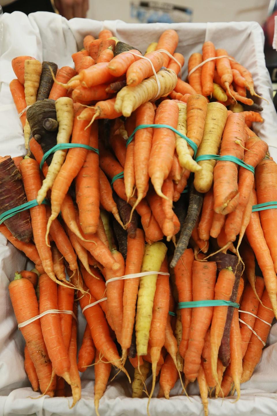 Rainbow carrots at the Countryside Winter Farmers' Market at Old Trail School in Bath.