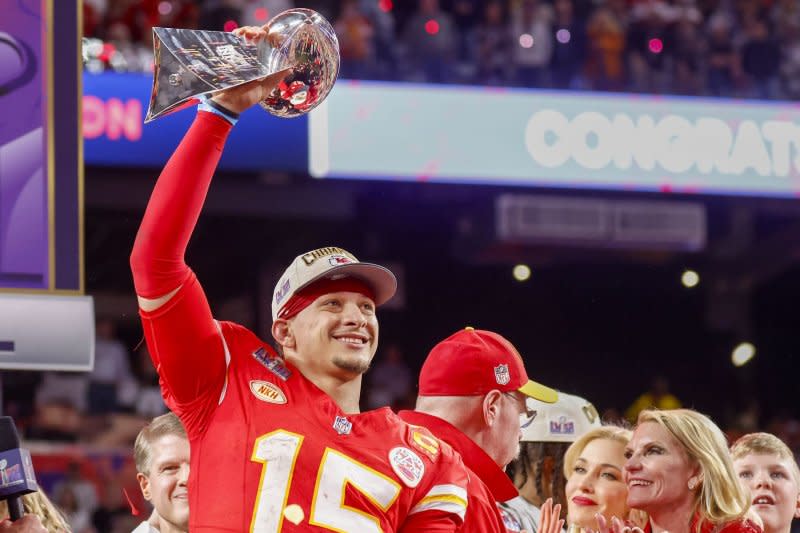 Kansas City Chiefs quarterback Patrick Mahomes holds the Vince Lombardi Trophy after defeating the San Francisco 49ers 25-22 in Super Bowl LVIII on Sunday at Allegiant Stadium in Las Vegas. Photo by John Angelillo/UPI