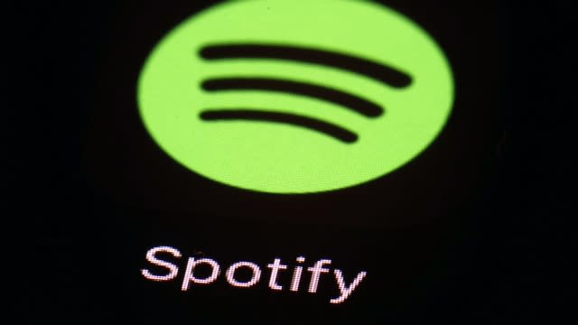 Spotify's logo is shown.