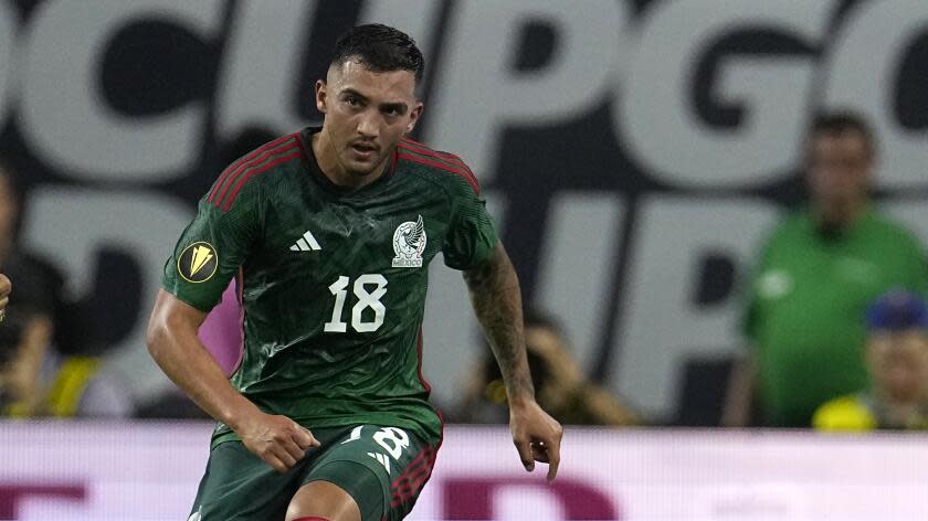 Mexico's Luis Chávez runs up the field during the first half of a CONCACAF Gold Cup soccer match against Honduras Sunday, June 25, 2023, in Houston. (AP Photo/David J. Phillip)