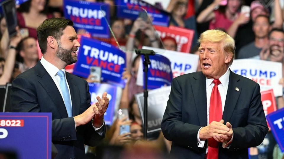 PHOTO: Former President Donald Trump and vice-presidential nominee J.D. Vance attend their first campaign rally together at Van Andel Arena in Grand Rapids, Mich, July 20, 2024.  (Jim Watson/AFP via Getty Images)