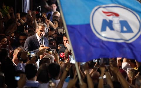 Kyriakos Mitsotakis talks to his supporters after th win - Credit: Thanassis Stavrakis/AP