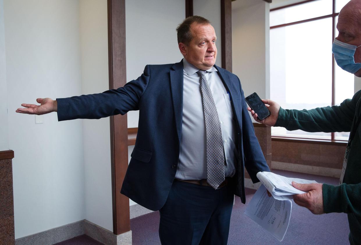 Attorney Thomas DeVore speaks to a reporter after a judge granted a temporary injunction sought by Sangamon County against his clients Tuesday, Nov. 17, 2020. DeVore's clients were restaurants in Springfield that were continuing to operate without food permits.The restaurants were serving indoor diners Sunday in defiance of the mitigations that went into effect last week and their licenses were suspended. [Ted Schurter/The State Journal-Register]