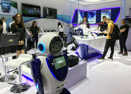 A police robot that can scan faces is seen on display at the China International Exhibition on Police Equipment in Beijing, China May 15, 2018. REUTERS/Pei Li