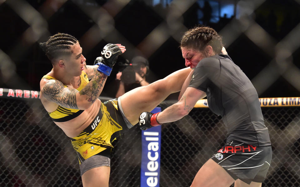 Jan 21, 2023; Rio de Janeiro, Brazil; Lauren Murphy (red gloves) fights Jessica Andrade (blue gloves) during UFC 283 at Jeunesse Arena. Mandatory Credit: Jason da Silva-USA TODAY Sports