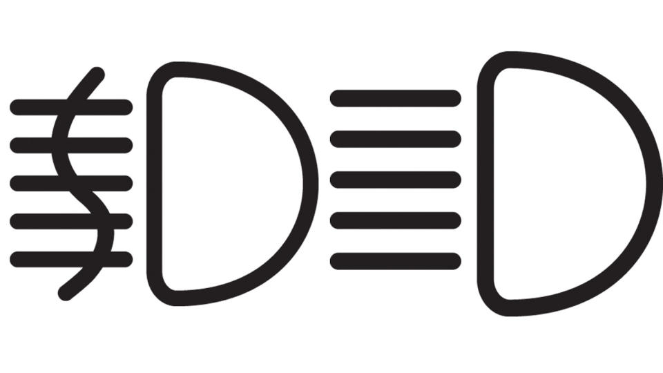 The fog light symbol (left) is similar to the switch for the high (right) and low beams, but has a curved line through the centre. Photo: Getty