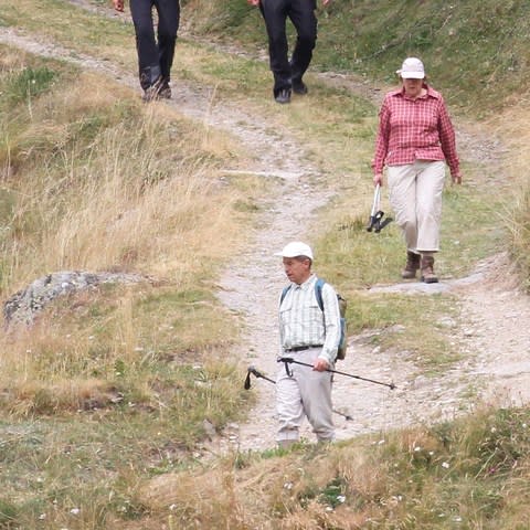 Angela Merkel on holiday in Solda with her husband Joachim Sauer  - Credit:  Splash News