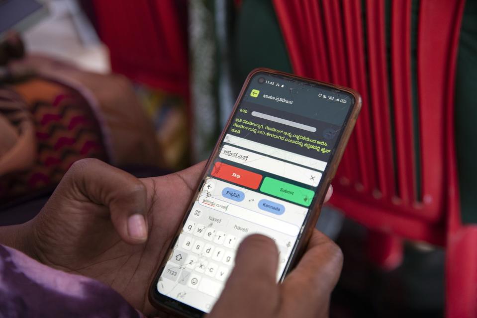 A worker gathers text, voice and image data in India's vernacular languages.