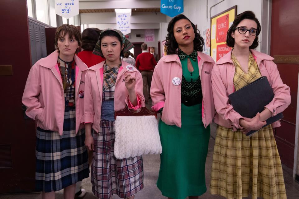 Before Rizzo, Frenchy and the gang, Cynthia Zdunowski (Ari Notartomaso, far left), Nancy Nakagawa (Tricia Fukuhara), Olivia Valdovinos (Cheyenne Wells) and Jane Facciano (Marisa Davila) rule Rydell wearing cool jackets in the Paramount+ prequel series "Grease: Rise of the Pink Ladies."