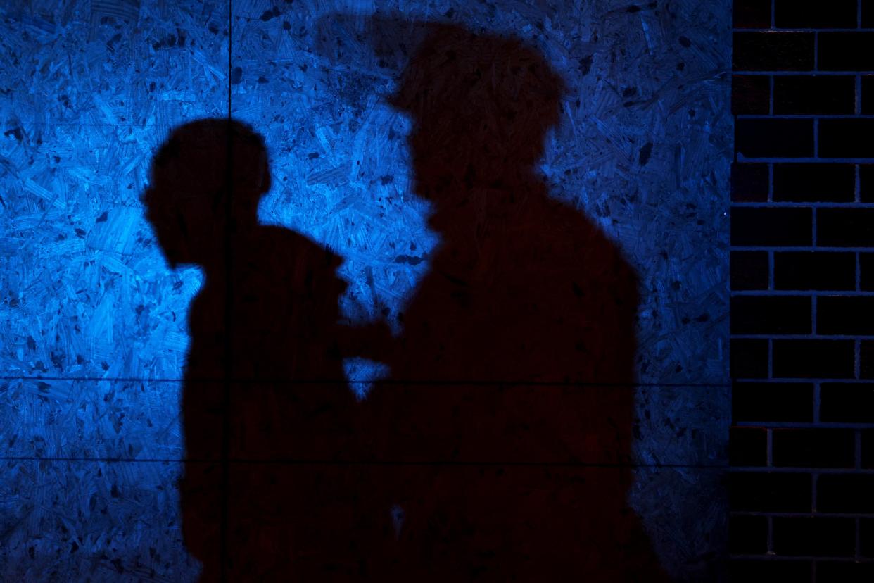 A police officer arrests a protester in the city of Louisville, Kentucky, on 23 September, 2020.  (Michael M. Santiago/Getty Images)